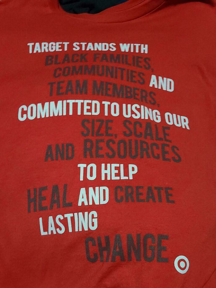 Red shirt with text supporting Black families and communities, reflecting old photos that aged badly with a facepalm-worthy message.
