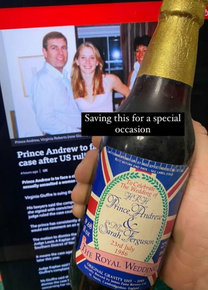 Hand holding a vintage bottle commemorating Prince Andrew and Sarah Ferguson's 1986 royal wedding in old photos that aged badly.