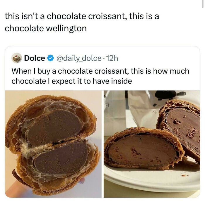 A chocolate croissant sliced open, revealing a generous amount of chocolate filling inside. Funny and unpredictable sentences.