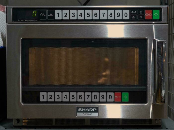 A durable, stainless steel Sharp commercial microwave, an example of a Buy It For Life purchase that didn't disappoint.