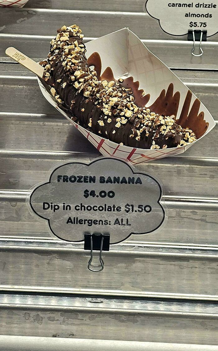 A frozen banana covered in chocolate and nuts, listed at $4.00, one of many mildly interesting pictures.