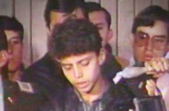 Young man at press conference related to morbid curiosity stories