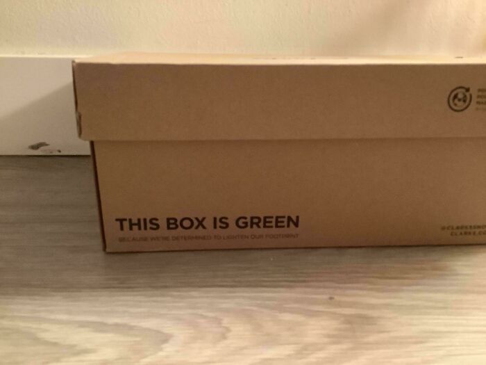 A baffling image of a brown cardboard box with the text THIS BOX IS GREEN, referring to its environmental impact.