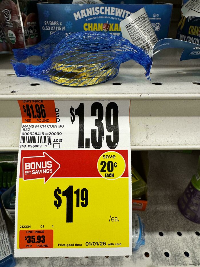 Price tag showing discount on chocolate coins with misleading packaging