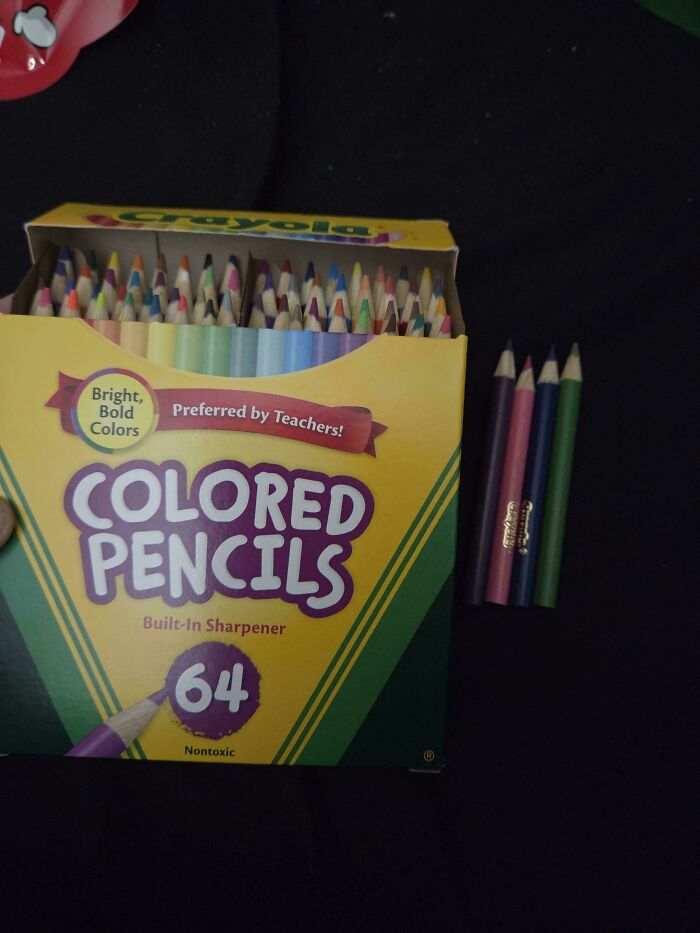 Box of Crayola colored pencils with built-in sharpener and some pencils outside