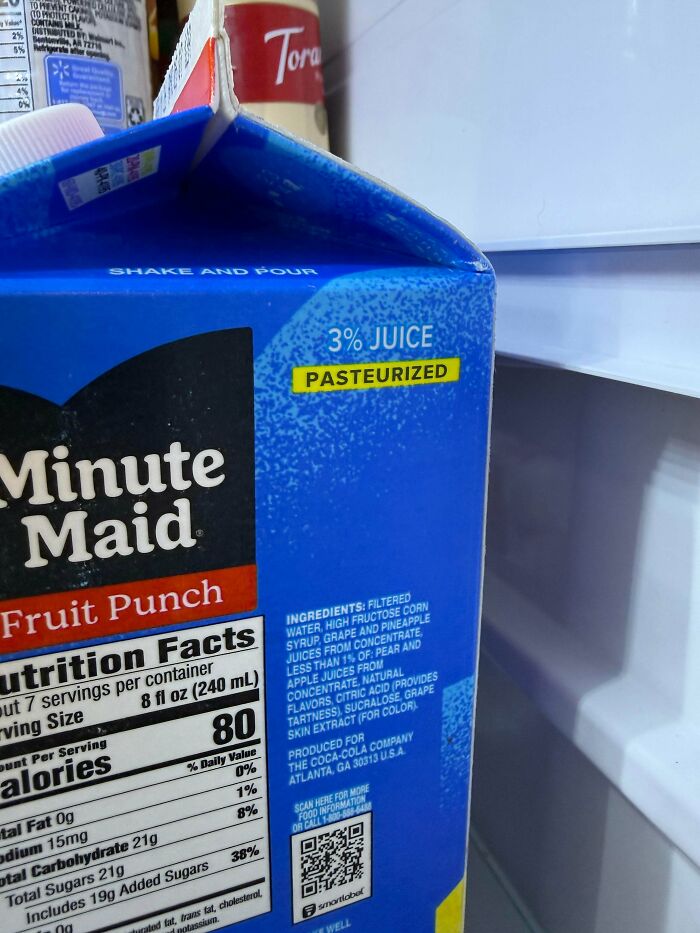 Minute Maid fruit punch carton labeled 3 percent juice and pasteurized in a refrigerator