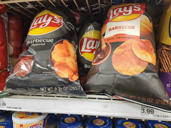 Lay's barbecue chips bags with different sizes and weights on store shelf