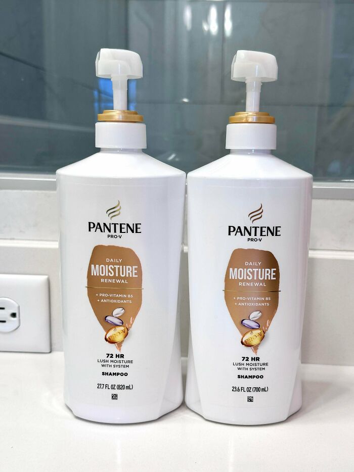 Two Pantene Pro-V Daily Moisture Renewal shampoo bottles side by side with different quantities