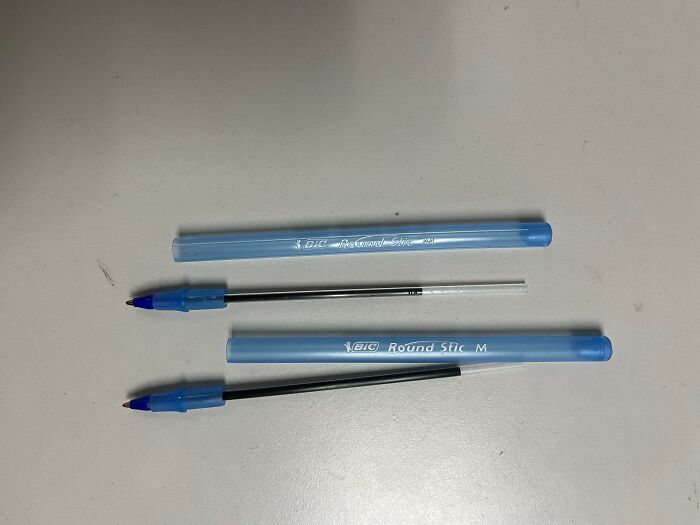 BIC blue pens with mismatched ink tube and pen body in scam example