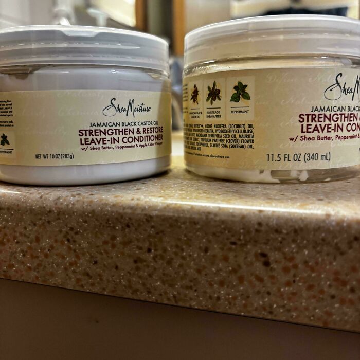 Jamaican black castor oil strengthen and restore leave-in conditioner jars on countertop