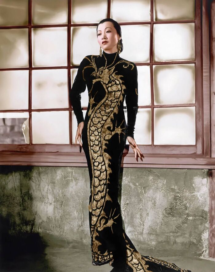 Anna May Wong Wearing Her Iconic Silk Charmeuse Dress Embroidered With Gold And Silver Sequins In A Dragon Motif Designed By Travis Banton For Her Role In The 1934 Hollywood Film Limehouse Blues