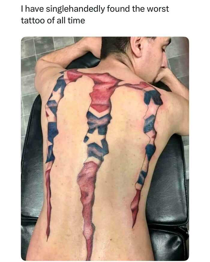 Back tattoo fail with torn flag design and caption about worst tattoo