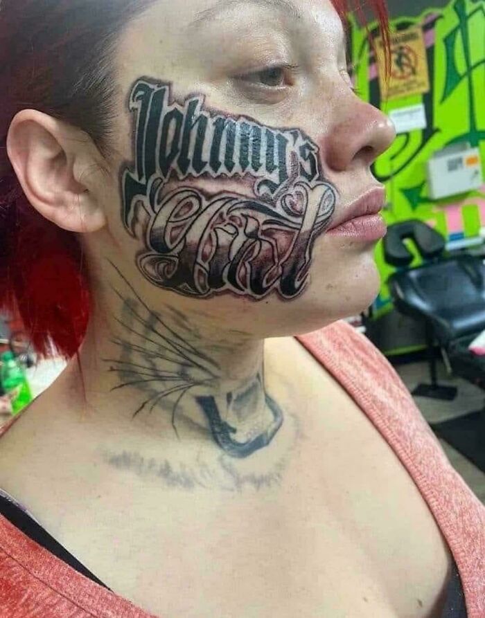 Face tattoo fail with large script lettering on cheek