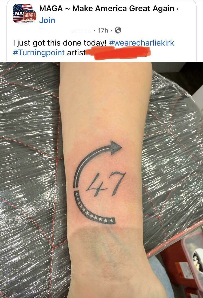 Tattoo fail with a flawed 47 arrow design on forearm