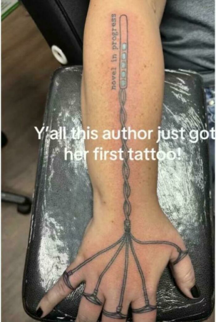 Tattoo fail of hand and arm with awkward rope and fingers outline