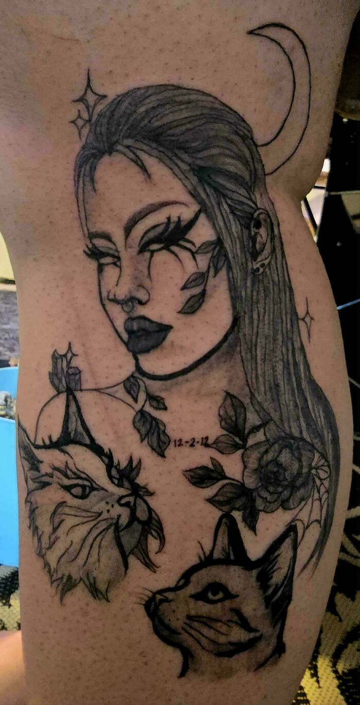 Black ink tattoo of woman with cats and moon on leg