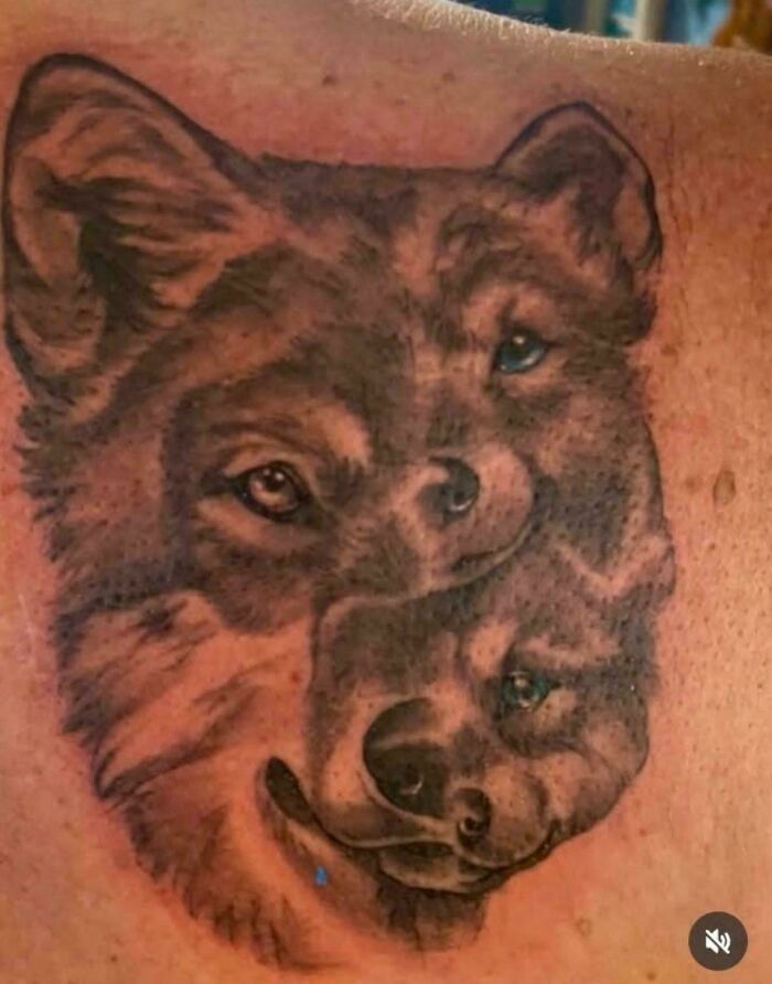 Tattoo fail with distorted double-faced bear on skin