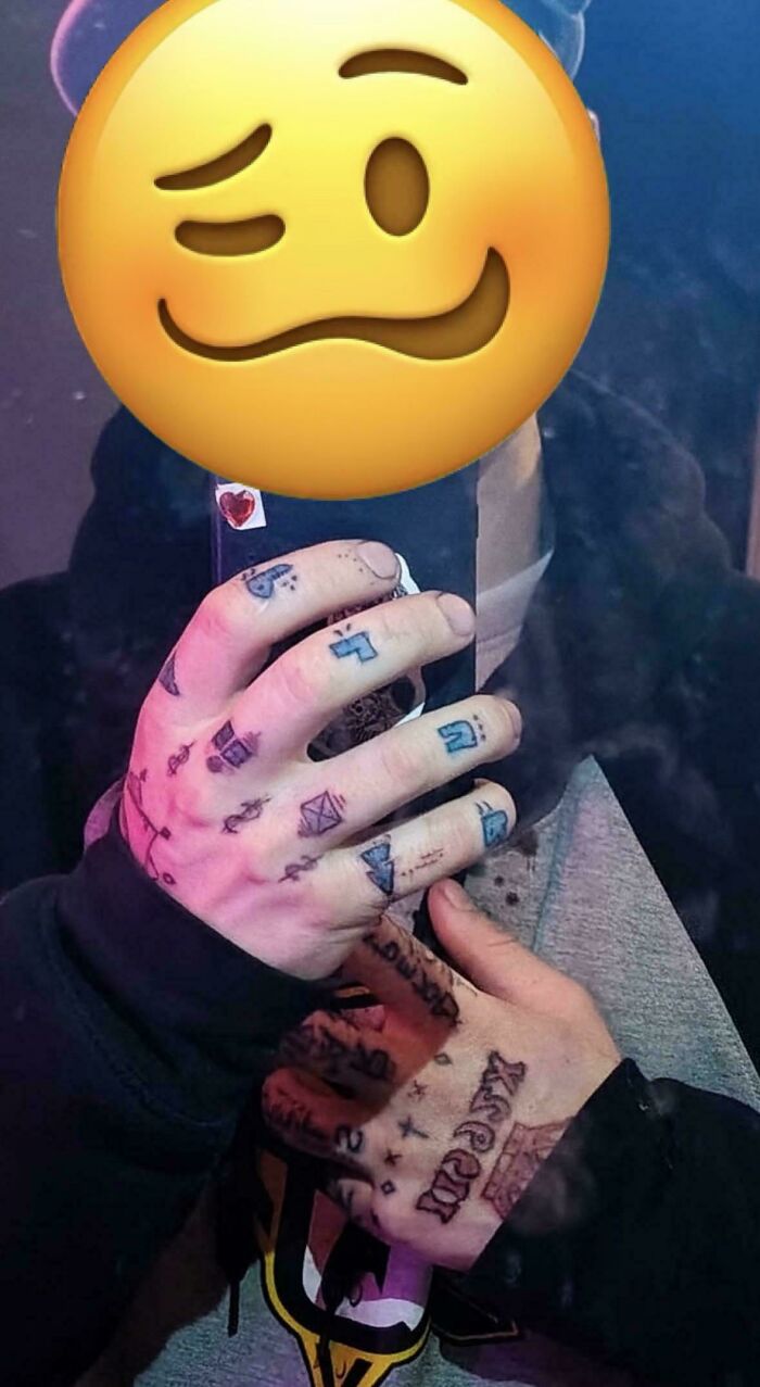 hand tattoos with Hebrew letters and small symbols