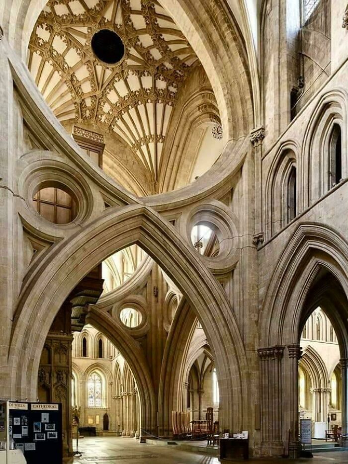 Intricate Gothic cathedral architecture with elaborate stone arches and vaulted ceiling