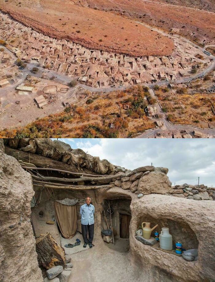 Aerial view of ancient cliff dwellings carved into a desert landscape
