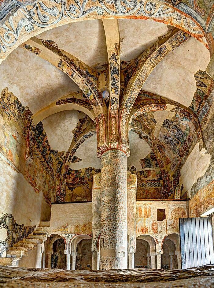 Ancient frescoed architecture featuring pillars and arches highlights incredible discoveries