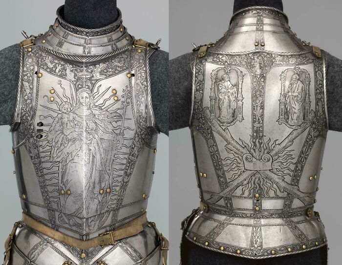 Decorated medieval breastplate armor featuring religious engravings discovery