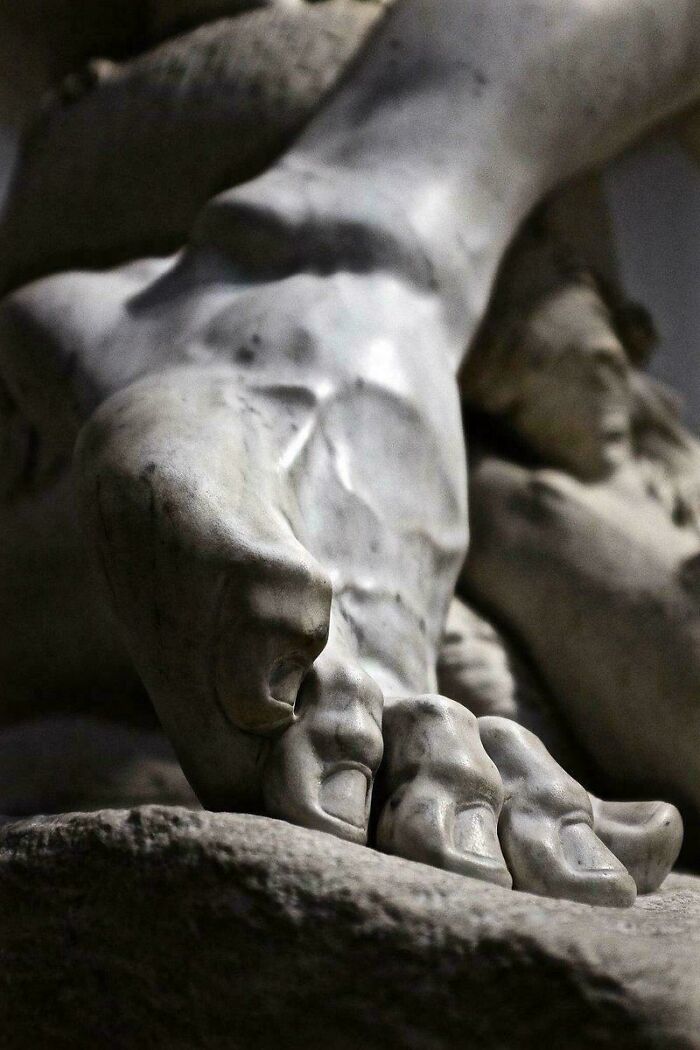 Close-up of classical marble sculpture foot from historical statue discovery