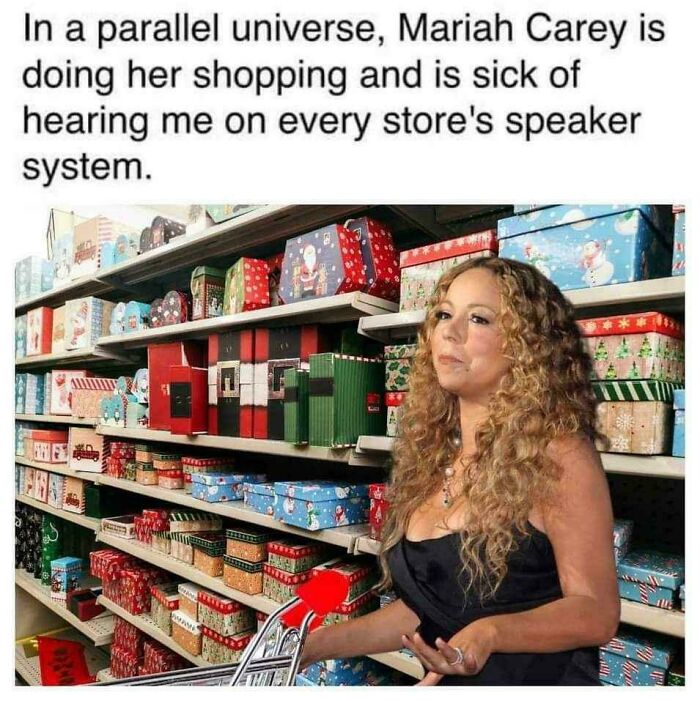 Mariah Carey shopping, looking annoyed, in an aisle filled with gift boxes. A funny post from Delusions of Adequacy.