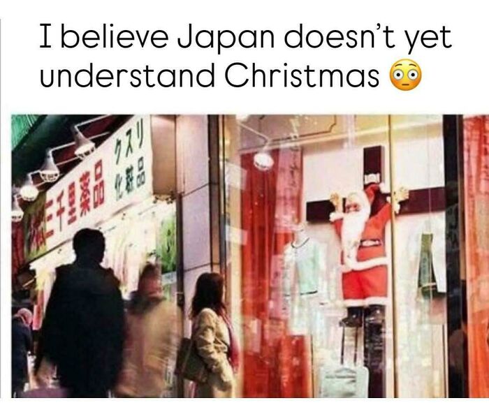 A storefront display in Japan with Santa Claus crucified, a post reflecting delusions of adequacy and cultural misunderstandings.