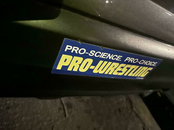 A funny bumper sticker that reads Pro-Science. Pro-Choice. PRO-WRESTLING.