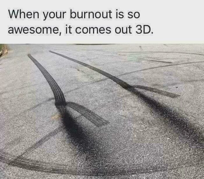 Tire burnout marks on pavement creating a misleading and confusing photo that looks like a 3D glitch in real life.