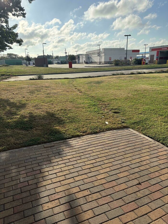 Small Desire Path From Apartments To Gas Station