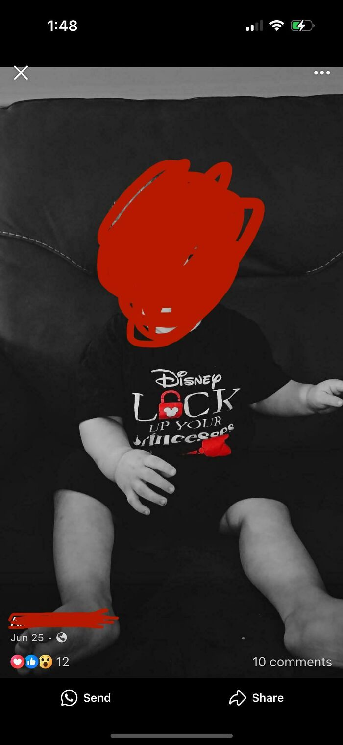 A black and white image of a baby, with face obscured, wearing a black Disney t-shirt that says Lock Up Your Princess. An unhinged mom post in parenting groups.