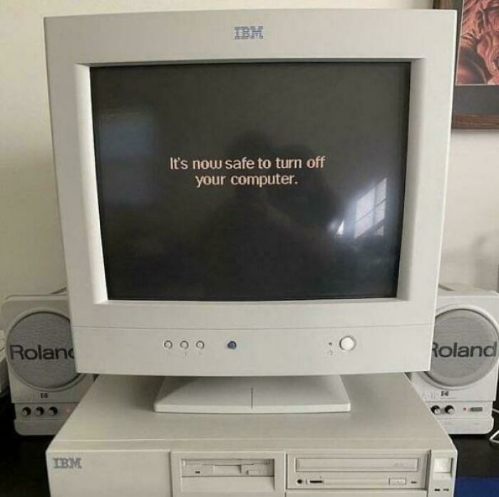 An old IBM computer monitor showing the message Its now safe to turn off your computer, a '90s kid memory.