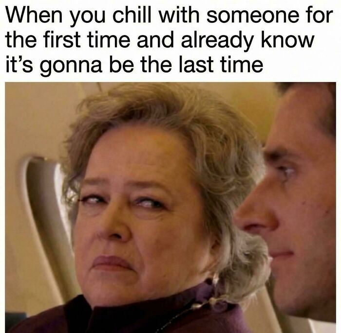 Woman giving a skeptical side-eye glance to a man, capturing relatable posts and memes about our lives and awkward moments.