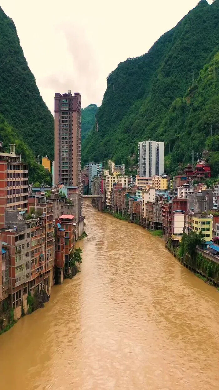 Yanjin, The Narrowest City In The World. At Its Widest, The City Spans No More Than 300 Meters (1,000 Feet), With Some Sections Narrowing To Just 30 Meters (100 Feet). The Population Is About 500,000