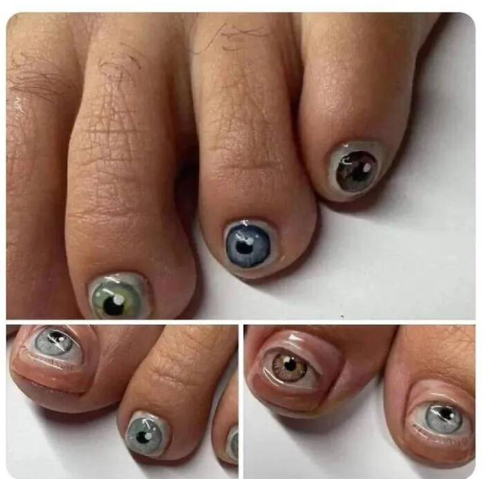 Toenails painted with realistic eyeball nail art designs