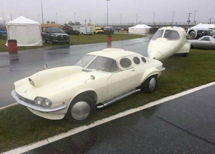 Unique car modified to pull a small airplane in creative design