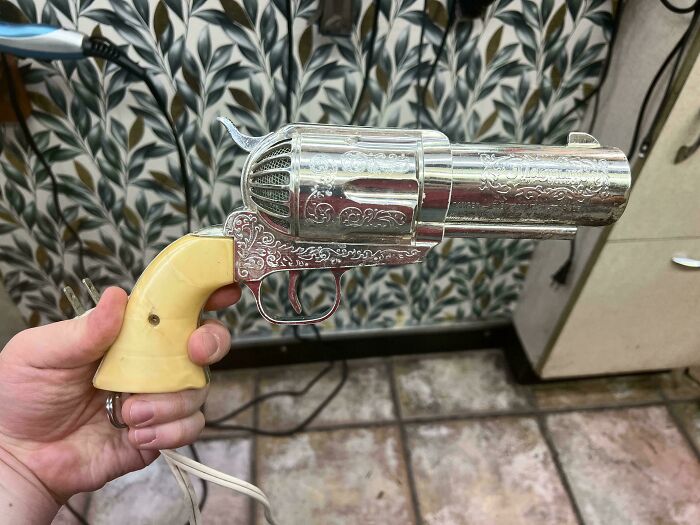 My Hairstylist Has A Hair Dryer That Looks Like A Revolver