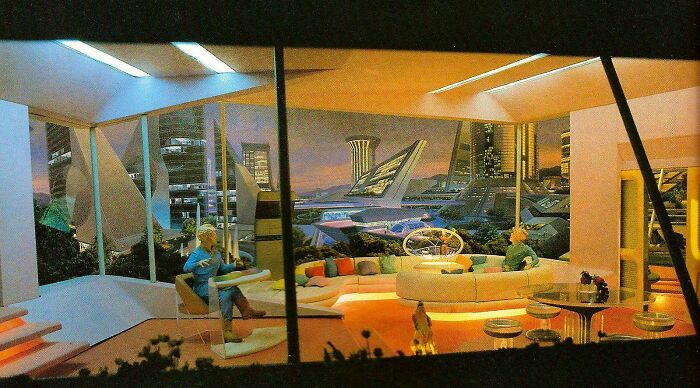 An interior view of a retrofuturistic home with large windows overlooking a city, showing how people imagined the future.