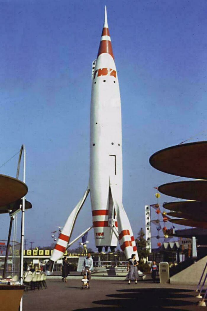 A retrofuturistic rocket with TWA branding, showing how people imagined the future with a sleek space vehicle.