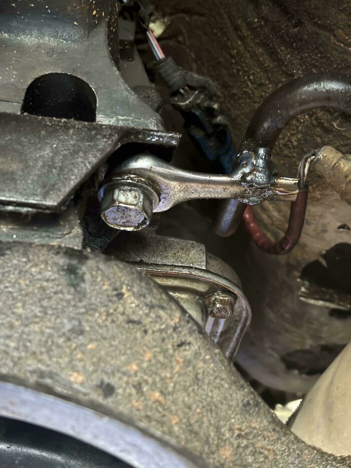 Close-up of a car part, illustrating the complex issues car mechanics encounter and document.