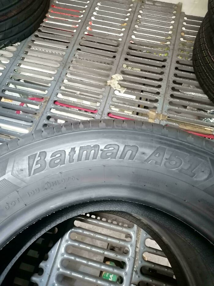 A car tire with the brand name Batman A51, an unusual item car mechanics might deal with.