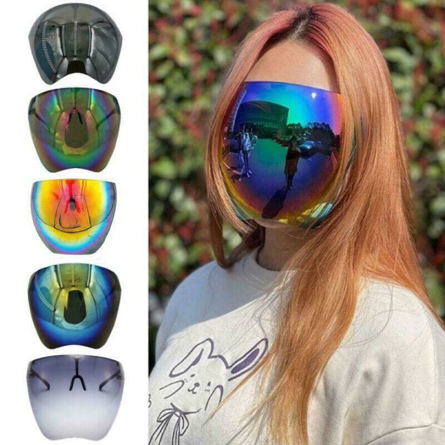 Person wearing an impossible to use rainbow reflective face shield covering the entire face, demonstrating flawed designer concept.