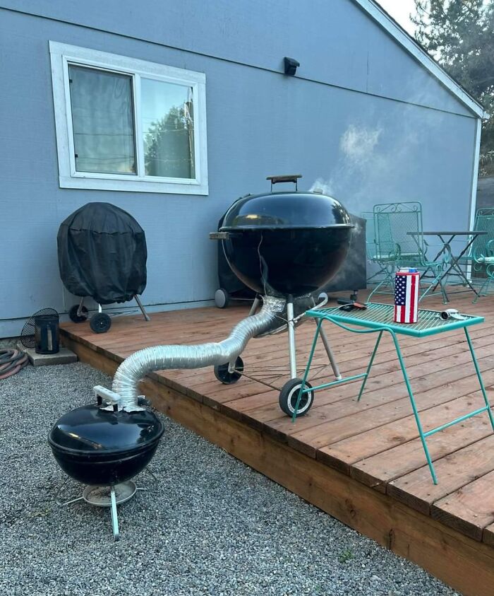 Creative genius ideas showing a DIY smoke extension system connecting two grills on a wooden deck.