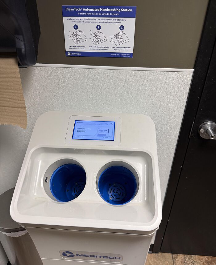 Automated handwashing station with dual sinks and digital screen demonstrating a genius solution for annoying hygiene problems.