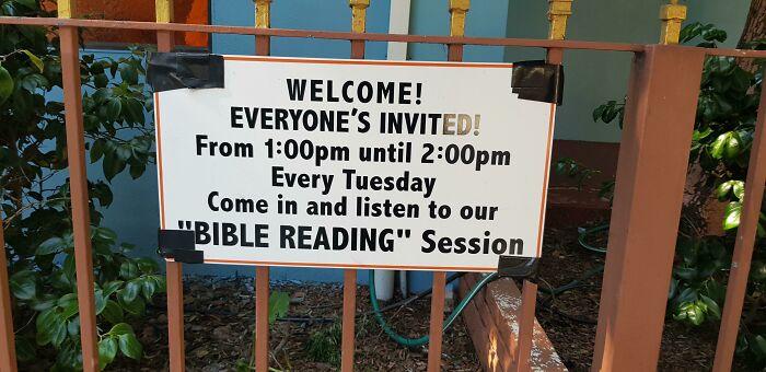 Sign on fence with misplaced quotation marks around Bible Reading, creating a hilariously suspicious message about a session time.