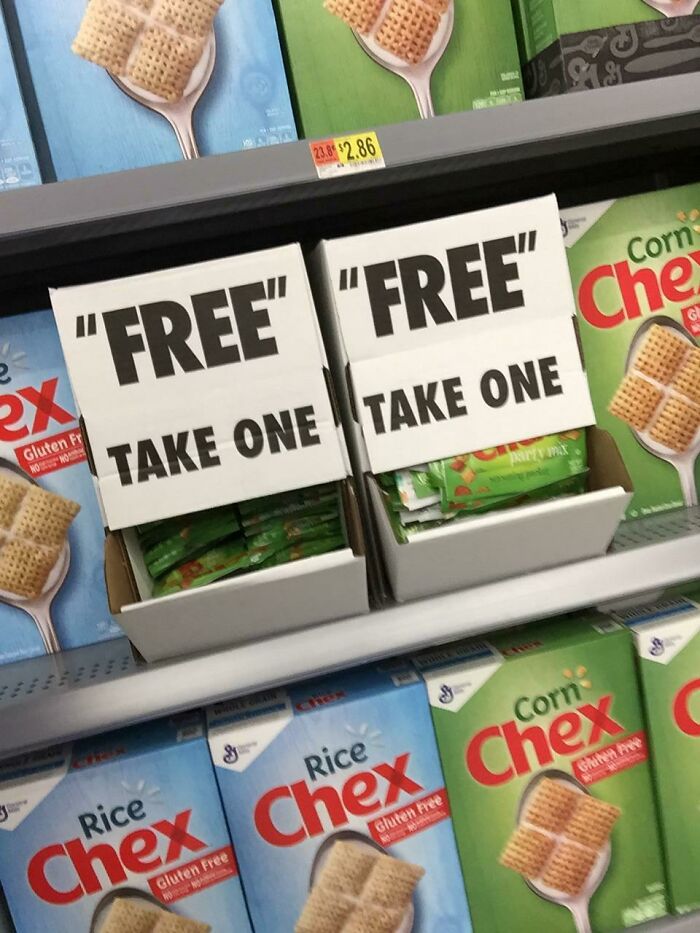Signs with suspiciously placed quotation marks around free, making the offer hilariously unclear at a store display.