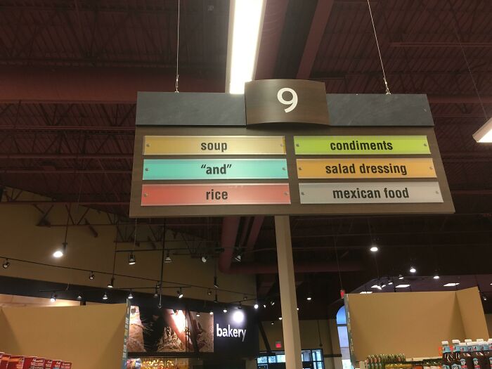 Grocery aisle sign with suspicious use of quotation marks around the word and, making the sign look humorous.