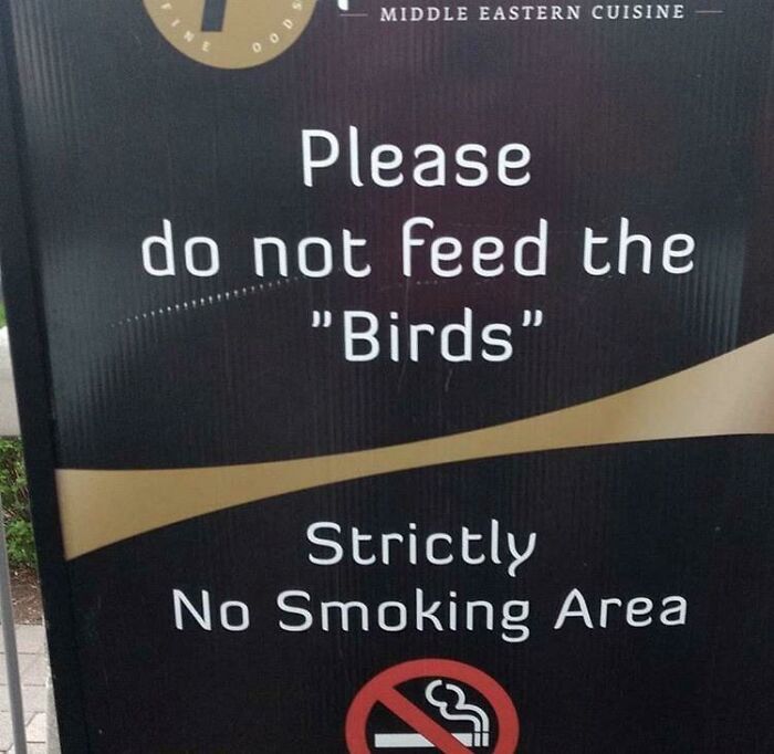 Sign with quotation marks around the word birds, making the message suspicious and humorous about feeding animals.